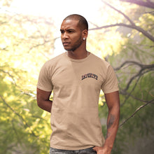 Load image into Gallery viewer, "INFINTIE VICTORY THROUGH JESUS CHRIST" TEE | FRONT CORNER ARCH + BACK (SAND)